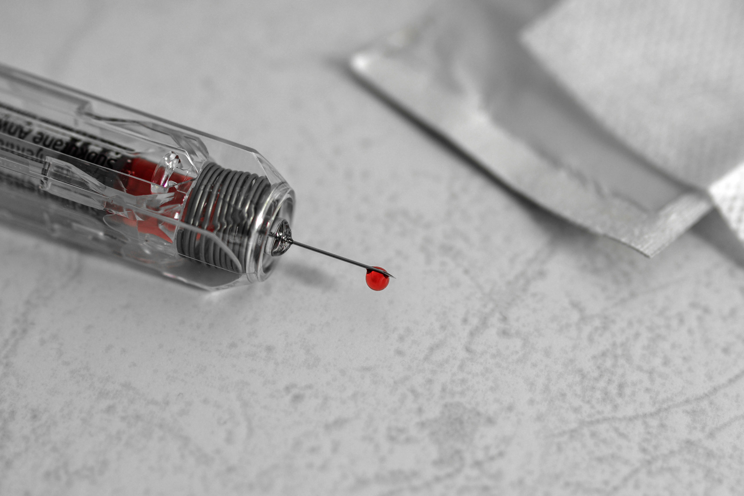Canva - White and Clear Glass Syringe