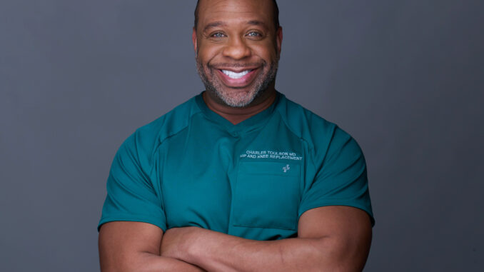 DR TOULSON 21NOV2024-47-1 Dr. Charles Toulson, MD, MBA, board-certified orthopedic surgeon and founder of the SURRE KNEE approach, smiles in a professional portrait. He is recognized as one of the nation’s leading experts in hip and knee replacement.